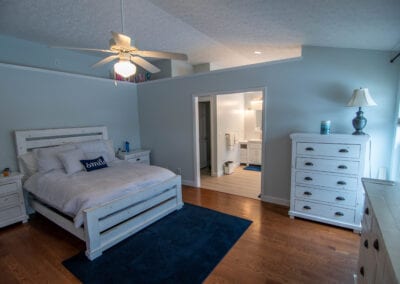 White colored bedroom with mat